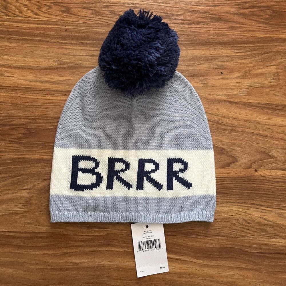 NWT Kate Spade light blue and white winter hat with pom pom